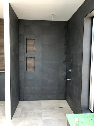 Custom Ensuite Curbless Shower w/ Niche Feature, and Feature Wall above Toilet 7