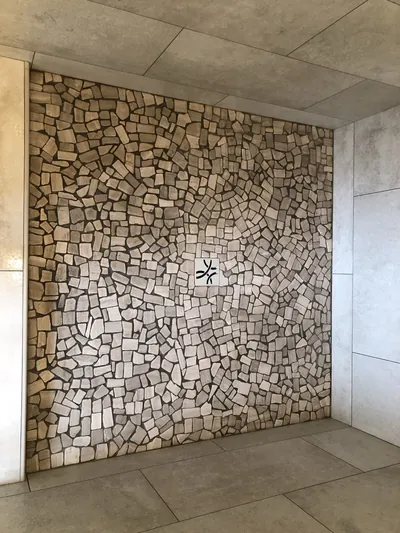 Custom Shower w/ Pebble Floor, Bench, Niche, and Feature Band Details 6