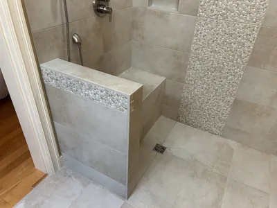 Custom Tile Shower w/ Bench, Pony Wall, Niche, and Feature Band Details 2