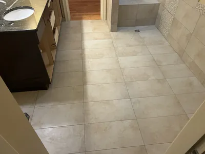 Custom Tile Shower w/ Bench, Pony Wall, Niche, and Feature Band Details 8