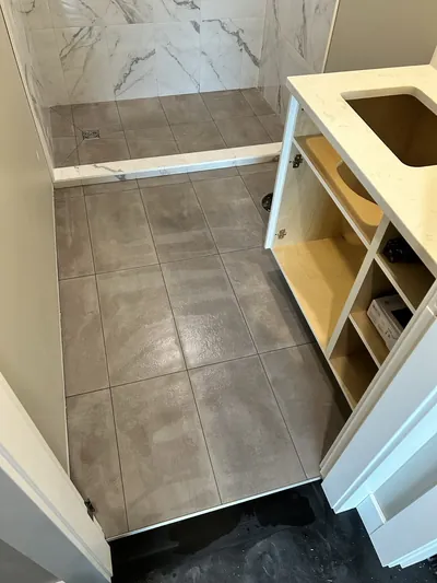 Custom Tile Shower w/ Wall Coloured Tile Curb 3