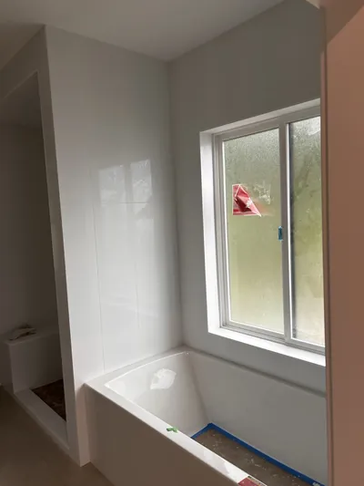 Custom Tile Shower/Tub Surround w/ Pebble Floor 1