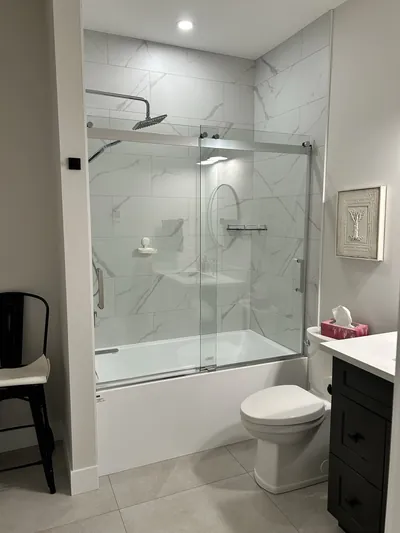 Shower/Tub Surround in Porcelain Carerra Style Tile 1