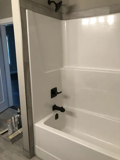 Tile Banding around a One Piece Tub/Shower Unit 1