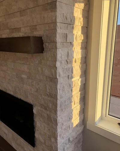 Floor to Ceiling Stone Fireplace Install 4