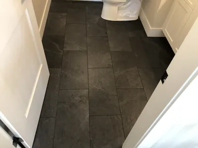 Dark Floor Tile Installation 1