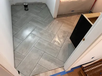 Herringbone Floor Tile Installation 1