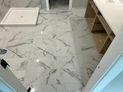 Stacked Layout Glossy Carerra Tile Floor 1