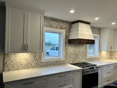 Fine herringbone tile backsplash