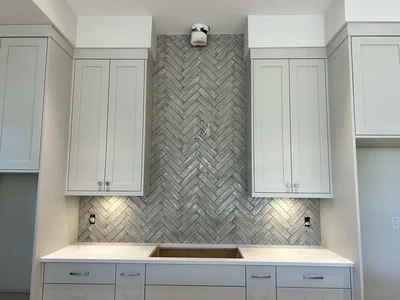 Herringbone tile backsplash
