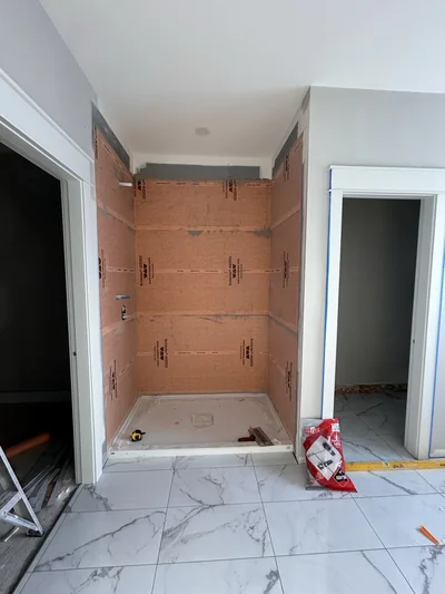 Schluter-Kerdi waterproofing membrane installed in a custom shower niche